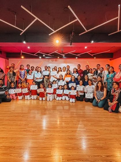 Our entire dance family, including students, parents, and mentors, celebrating a successful Studio Showcase 2024. It's a community effort that makes these events possible.