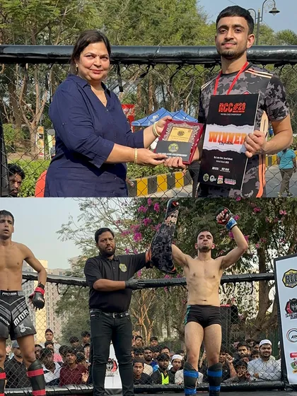 Jatin receiving his winner's plaque and having his hand raised by the referee. A well-deserved victory earned through sheer dominance.