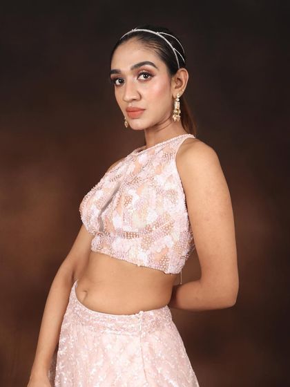 A profile shot highlighting the soft contour and glowing skin. Achieving this natural-looking radiance is a key skill taught in my course.