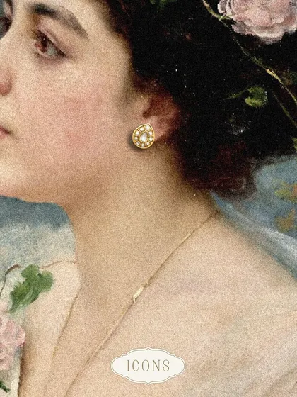 The Ariel Studs are a miniature version of the iconic Luna Necklace. These studs feature intricate details and a captivating design, making them a perfect piece of everyday luxury.