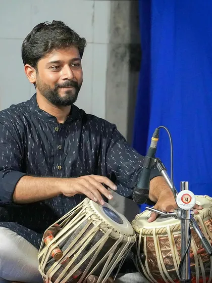 A concert photograph, capturing the focus and intensity of a live performance.