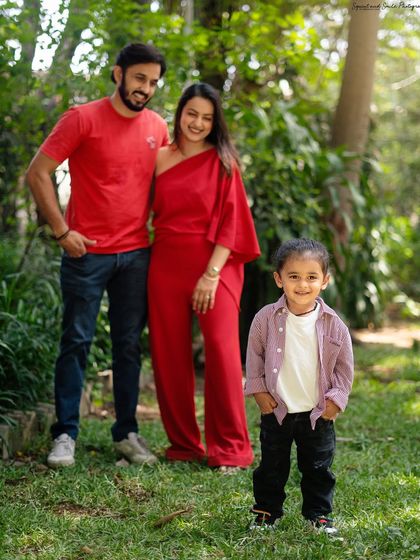 A cool and casual shot from an outdoor session. I love capturing individual personalities, like this little boy standing confidently in front of his smiling parents.