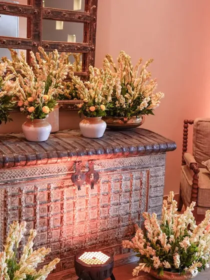 Another view of our Rajnigandha decor. By placing these fragrant floral arrangements around the event space, we transformed a simple corner into an elegant and inviting area for guests.