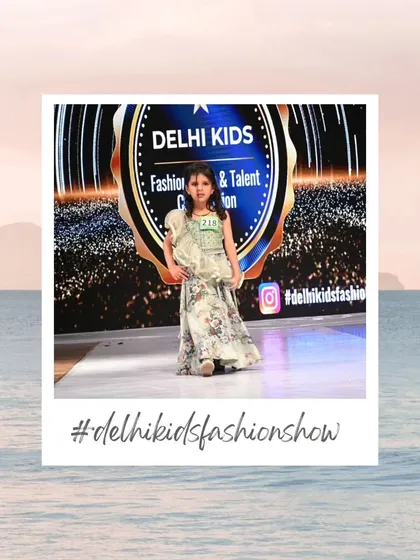 Here I capture the beauty of children's ethnic wear on the runway. This young model looks graceful in a floral lehenga, showcasing the versatility of our fashion events. Including traditional attire in a portfolio is a great way to broaden a child model's appeal.