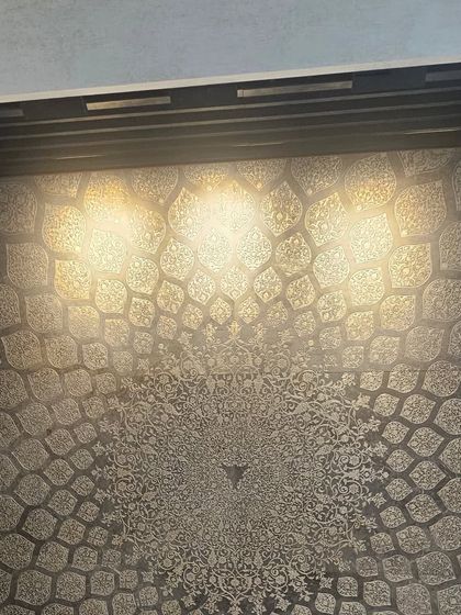 An intricate mandala pattern with metallic finishing, creating a mesmerizing effect when lit. This panel is perfect for meditation rooms or grand entrance lobbies.