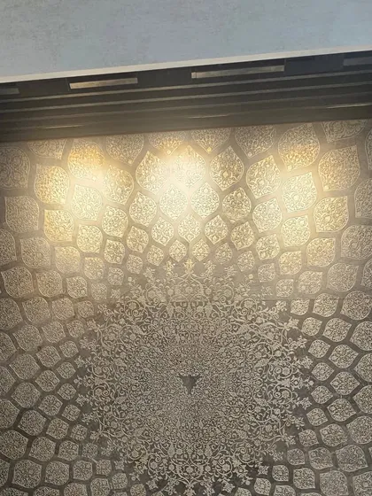 An intricate mandala pattern with metallic finishing, creating a mesmerizing effect when lit. This panel is perfect for meditation rooms or grand entrance lobbies.
