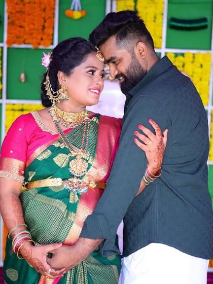 A sweet moment from a baby shower. Our client Asha looks beautiful in a traditional temple jewellery set, her happiness shining through.