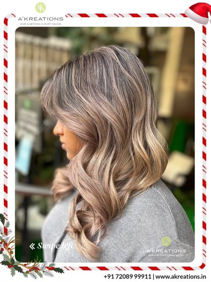 This stunning ash-blonde balayage creates a beautiful gradient effect. The soft curls at the end add volume and showcase the seamless color transition.