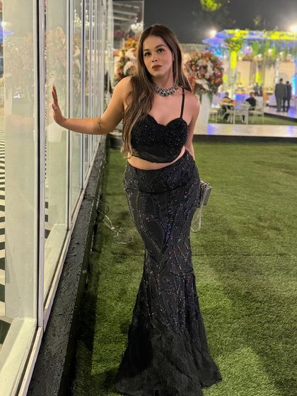 The wedding season means getting ready like a maharani to do the hard work of an emcee. This black sequin gown is my uniform for a night of glamour and hosting.