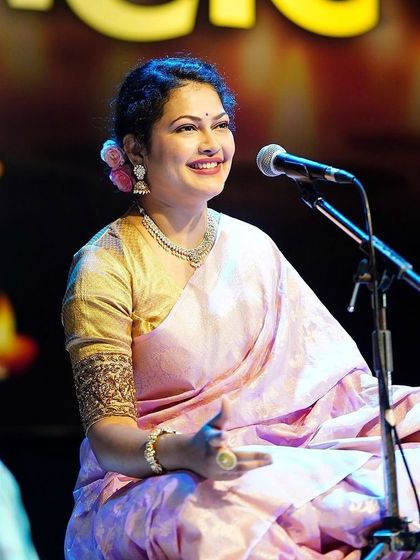 Priyanka Barve enchanting the audience during her Diwali Pahat performance in a graceful pink and gold ensemble.