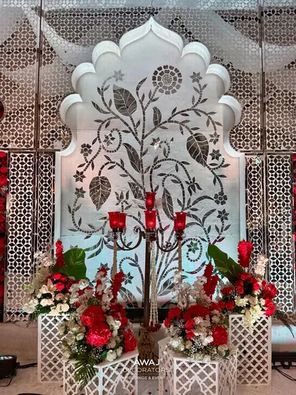 A detail shot of the side panels, featuring delicate tree-of-life motifs and elegant candelabras, adding a layer of traditional artistry.