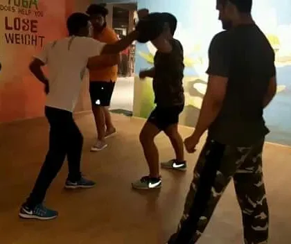 Controlled sparring during a fitness camp. Even in a group setting, I focus on individual technique to ensure everyone is learning effective combat skills.