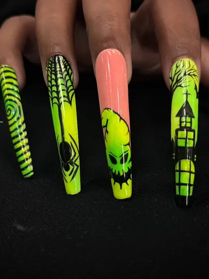 The other side of the hand, showcasing the spiderweb and spiral designs from the neon Halloween set.
