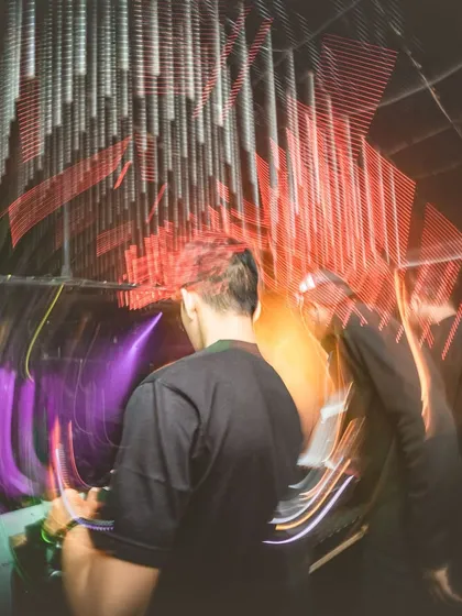 A creative shot showing the passage of time and motion behind the decks.