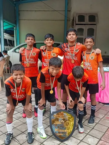 Our U13 team celebrating their championship win at the 5v5 Sports tournament.