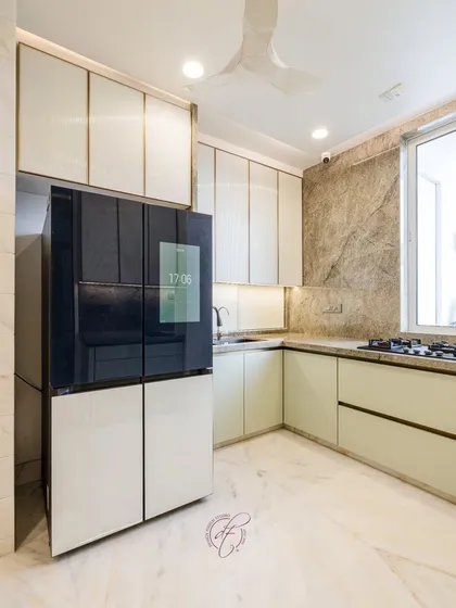 This angle highlights the smart fridge and the custom cabinetry built around it, ensuring a perfect fit and a clean, integrated look.