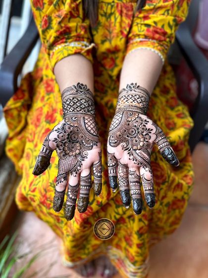 This was a Karwa Chauth design for a wonderful client. The pattern is a mix of traditional Indian motifs, with delicate floral work and detailed netting on the fingers and wrist.
