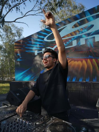 Another shot of me with my hand up, feeling the energy from the Sunburn Holi crowd in Jammu.