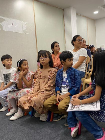 Our youngest audience members watching intently. We inspire a love for music from a very early age.