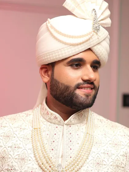 A close-up view of a natural wedding day look. Notice the smooth skin texture and defined features. I use high-quality products to create a look that is both flawless and masculine.