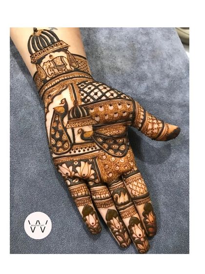 A majestic peacock design featuring a jharokha (window), an elephant, and a swan for a truly royal look.