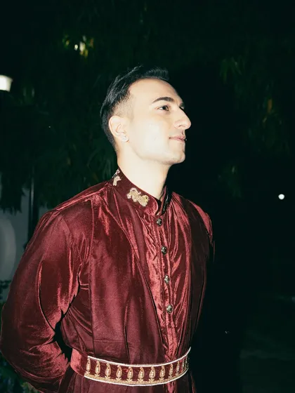 A profile shot at night, the rich color of the velvet standing out against the darkness.