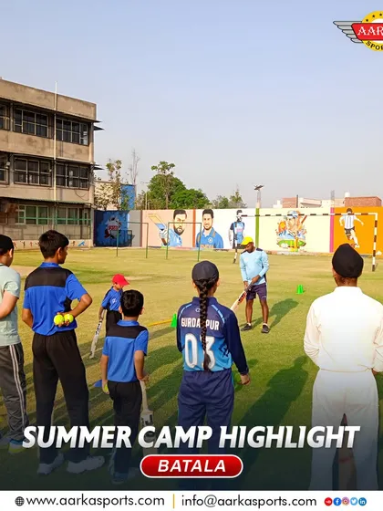 A coach watches over a group of students during the Batala summer camp. I ensure there is always expert guidance available.