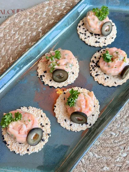 My unique Prawn Donut, a creative and savory bite-sized canapé that adds a touch of elegance to any celebration.