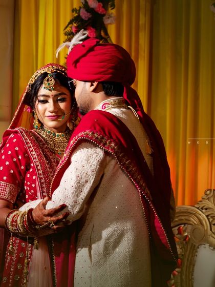 The cover or opening page of a wedding album, featuring a romantic portrait of the couple.