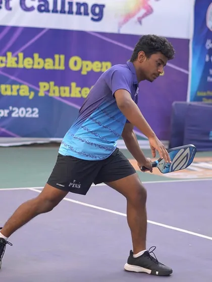 Here is one of our dedicated young players, focused and ready during a competitive match. We nurture this passion and drive in our athletes, helping them chase their dreams one point at a time.