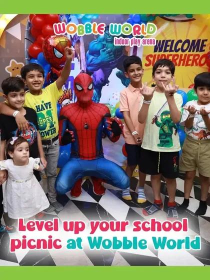 A group of students on a school picnic pose with Spiderman. Our venue is perfect for leveling up school outings with fun activities and entertainment.