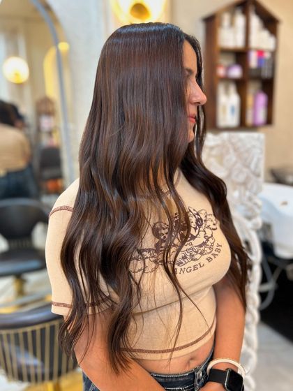 A side profile of the olive ashy brown, highlighting the cool, ashy tones and healthy shine.