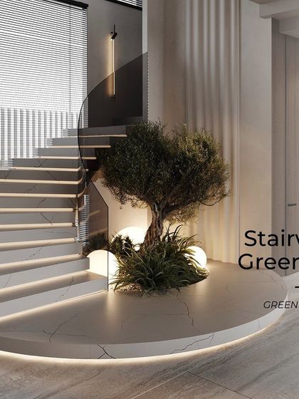 A beautiful faux olive tree is set within a curved, marble-clad platform at the base of a spiral staircase. The integrated LED lighting along the base accentuates the clean lines and makes the tree a sophisticated focal point.