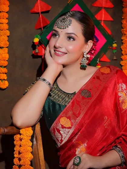 An entire Diwali-themed shoot featuring our red Banarasi saree. This series shows a complete concept, from decor to final look, providing rich inspiration for festive content.