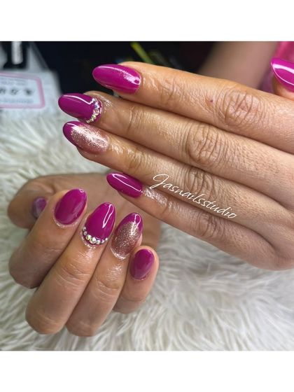 A vibrant magenta set with a gold glitter accent and rhinestone details. This set is available for just ₹799!