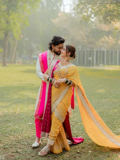 A tender moment from a Maharashtrian wedding, showcasing the rich traditions and colorful attire. We have extensive experience in capturing the unique beauty of regional ceremonies.