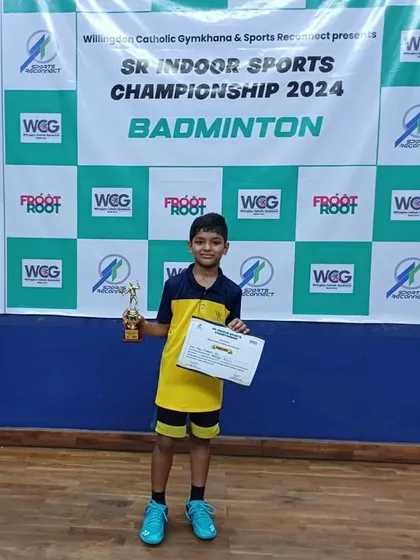 Liam Pais with his bronze medal from the U12 Boys Singles, a hard-earned achievement in a competitive field.