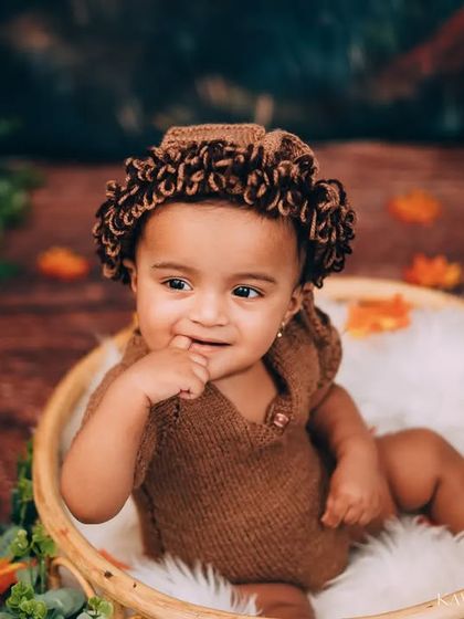 A thoughtful expression from our little jungle adventurer. I aim to capture a variety of moods and expressions that show off your baby's budding personality.