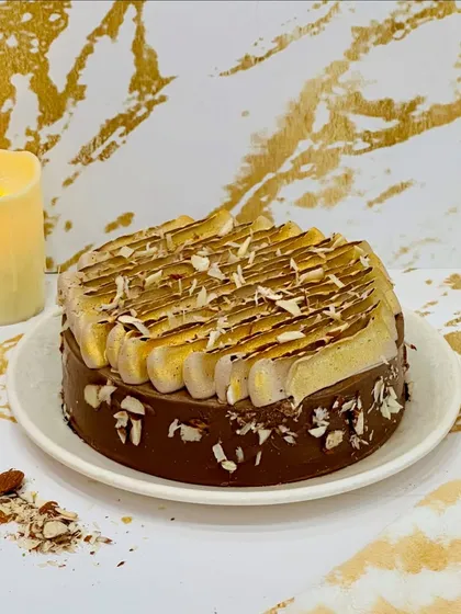 My Almond Gateau is a new favorite. It features a rich chocolate base, a crunchy almond texture, and a beautifully torched meringue topping. The combination of creamy chocolate, nutty almonds, and light meringue is truly special.