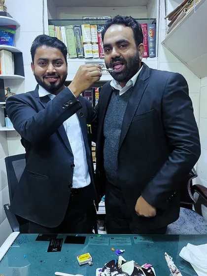Another happy moment from the birthday celebration in our office.