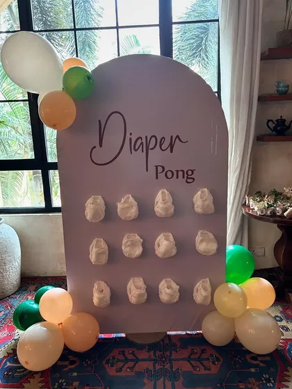 Another 'Diaper Pong' setup, this time for a tropical-themed baby shower. We can customize games to match any theme.