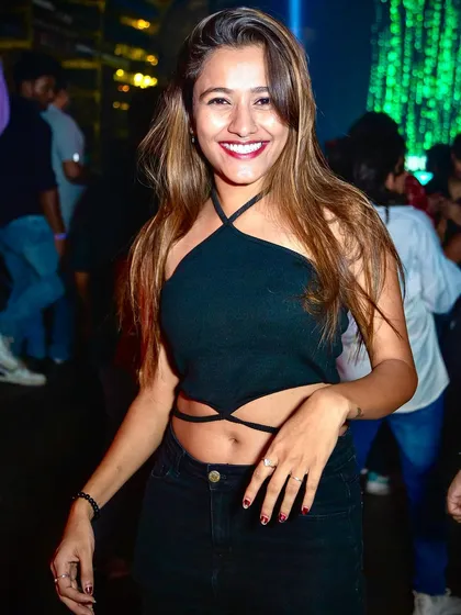 A guest enjoying the music on the dance floor.