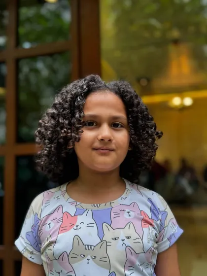 Born to be wild and curly! This little one got a fresh cut to shape her beautiful curls, making them bouncy, healthy, and easy for her parents to manage.