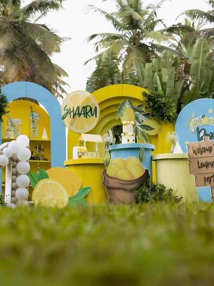 Another full view of the lemonade party, capturing the bright and refreshing atmosphere created by the yellow and blue decor.