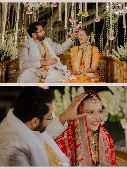 The groom applying sindoor, a significant and emotional ritual in a Hindu wedding.