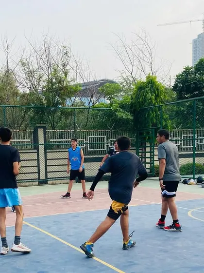 A player prepares to shoot a free throw, a crucial skill that requires focus and repetition. We dedicate time to practicing these high-pressure shots.