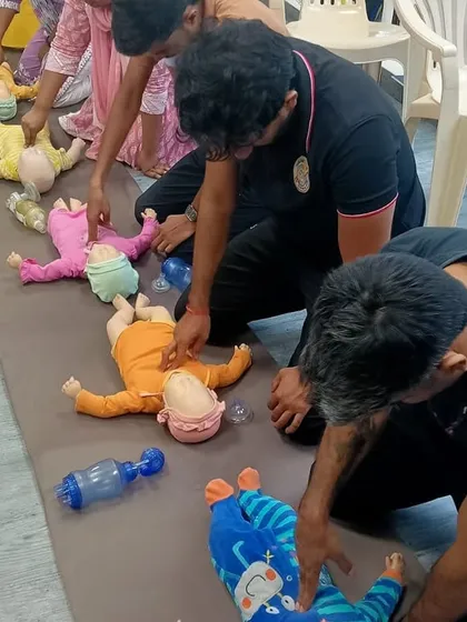 Practicing chest compressions on infant manikins. The technique is different from adults, and this hands-on training ensures we are proficient in all aspects of CPR.