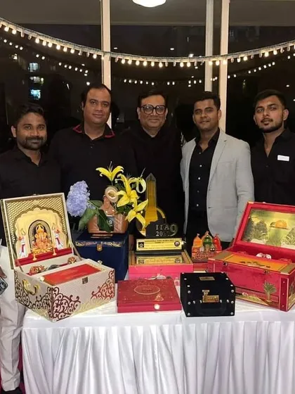 Our dedicated team celebrating the award win. We are passionate about every detail and are honored to create beautiful, memorable invitations and gifts for your celebrations.