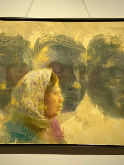 My painting "Echoes in Her Eyes" framed and hanging in the gallery.