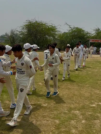 The winning team walking off the field, proud of their achievement.